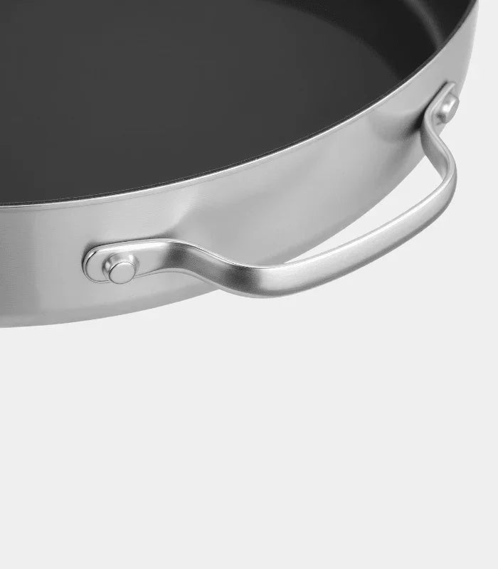 Runde Edelstahlpfanne mit Griff, ideal für Pizzaofen und Küche