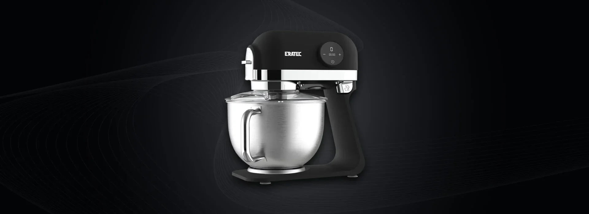 Modern food processor with stainless steel bowl and black housing against a dark background